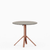All‑aluminium dining table with compact‑laminate top and foldable slatted surface.