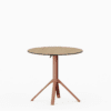 All‑aluminium dining table with compact‑laminate top and foldable slatted surface.