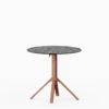 All‑aluminium dining table with compact‑laminate top and foldable slatted surface.