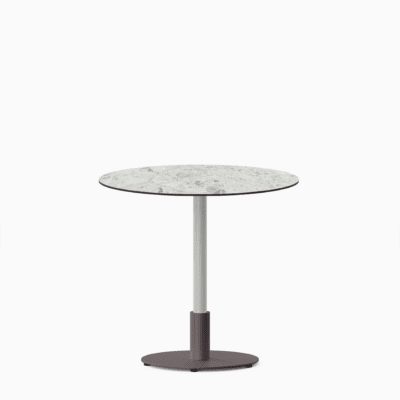 Round dining table with compact‑laminate top and metal pedestal base.