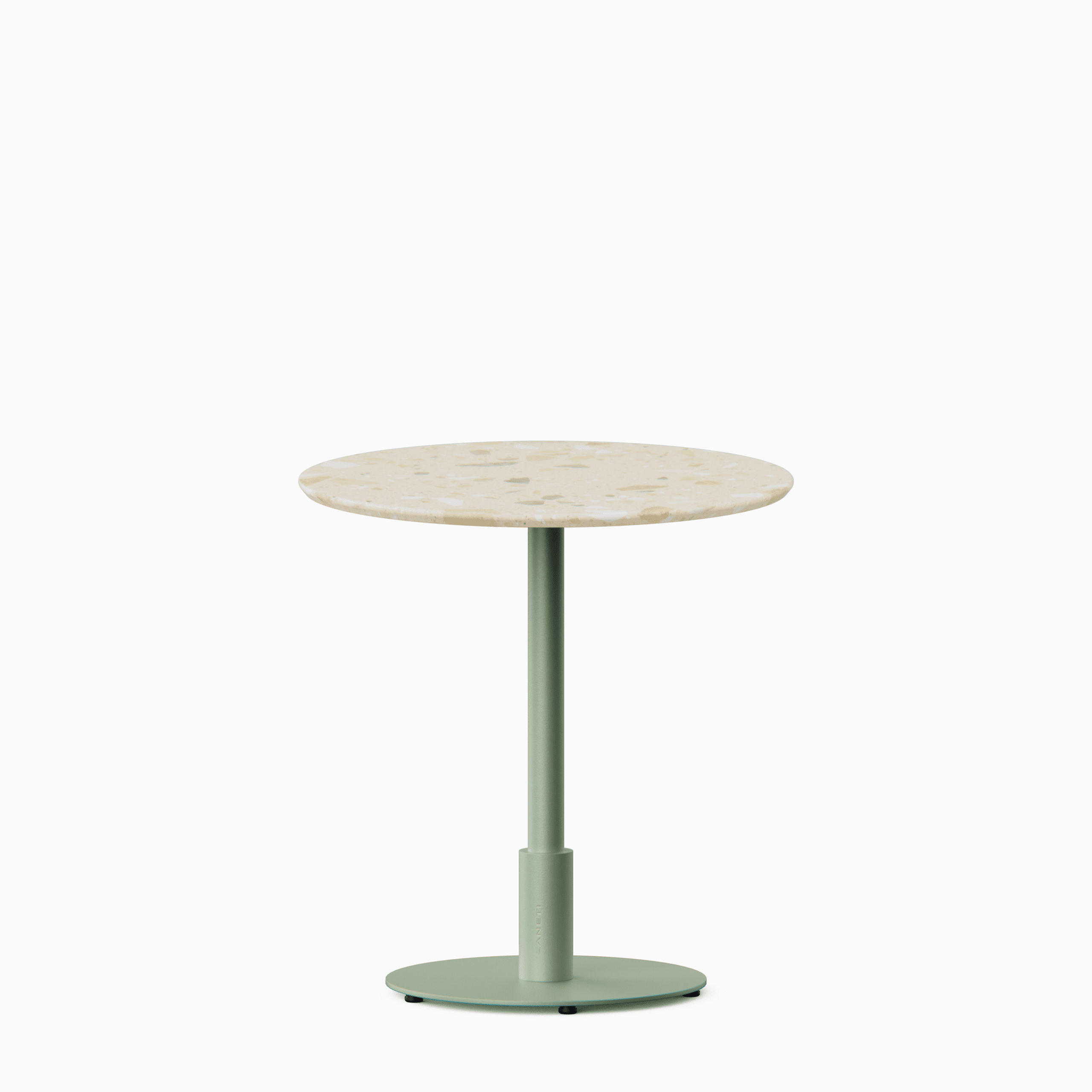 Round dining table with terrazzo top and metal pedestal base.
