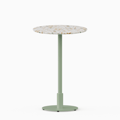 Round bar table with terrazzo top and metal pedestal base.