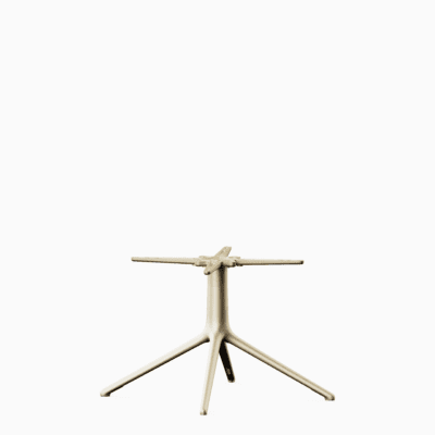 A sculptural aluminium coffee table base for 4-legs.