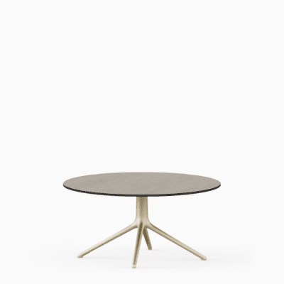 Round dining table with compact‑laminate top and aluminium base