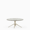 Round dining table with compact‑laminate top and aluminium base