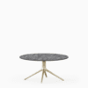 Round dining table with compact‑laminate top and aluminium base