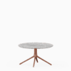 Round dining table with marble top and aluminium base.