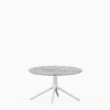 Round dining table with marble top and aluminium base.