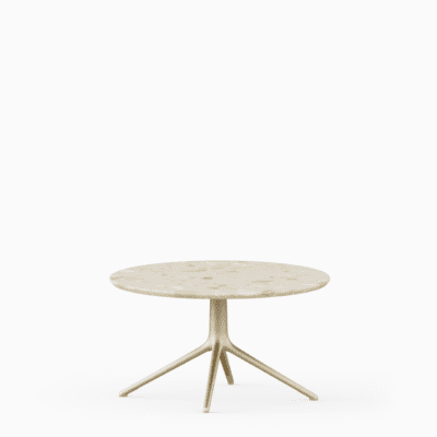 Round coffee table with terrazzo top and aluminium base.”