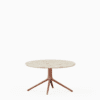 Round coffee table with terrazzo top and aluminium base.”