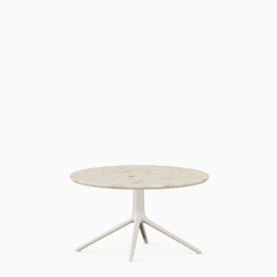 Round coffee table with terrazzo top and aluminium base.”
