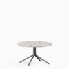 Round coffee table with terrazzo top and aluminium base.”