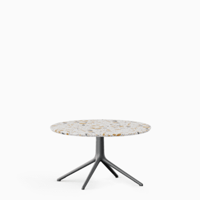 Round coffee table with terrazzo top and aluminium base.”