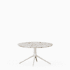 Round coffee table with terrazzo top and aluminium base.”