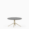 Round coffee table with terrazzo top and aluminium base.”