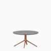 Round coffee table with terrazzo top and aluminium base.”