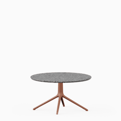Round coffee table with terrazzo top and aluminium base.”