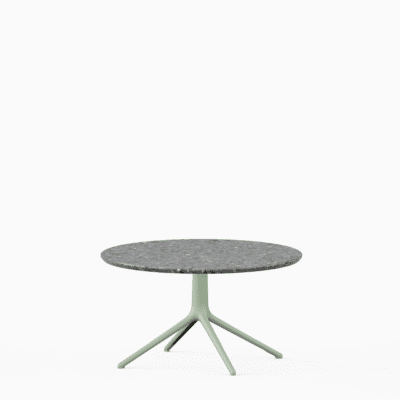 Round coffee table with terrazzo top and aluminium base.”