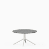 Round coffee table with terrazzo top and aluminium base.”