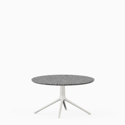 Round coffee table with terrazzo top and aluminium base.”