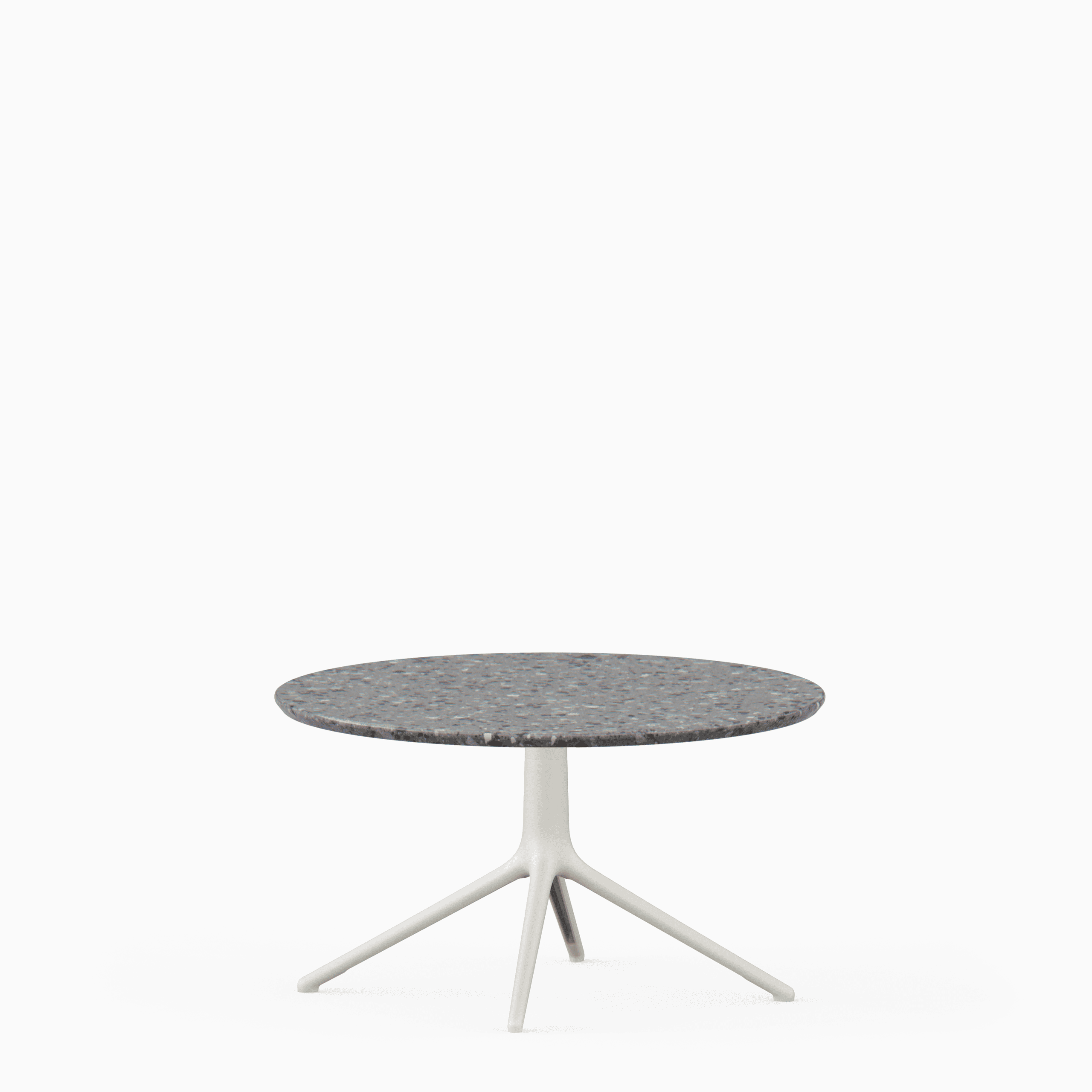 Round coffee table with terrazzo top and aluminium base.”