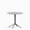 Round table with marble top and cast aluminium base.