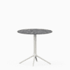 Round table with compact laminate top and cast aluminium base.