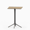 Square table with compact laminate top and cast aluminium base.