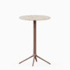 Round table with terrazzo top and cast aluminium base.