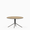 Round compact‑laminate coffee table with aluminium base.